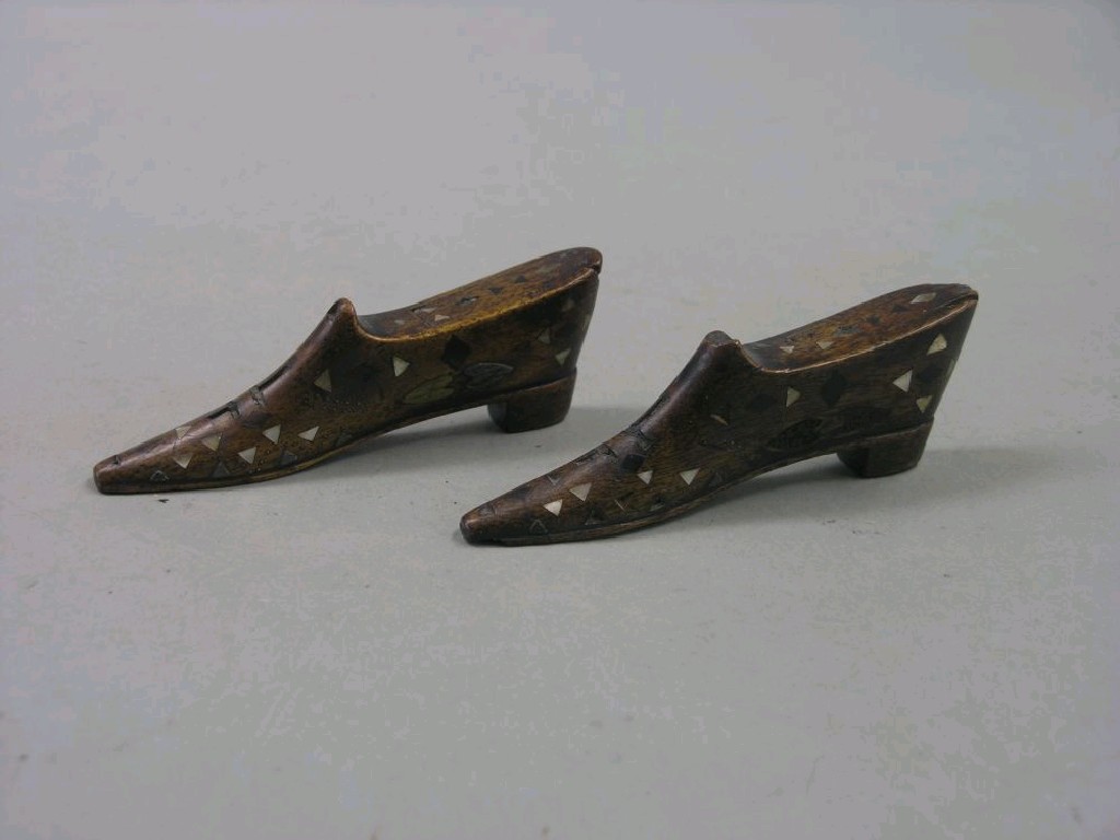 Appraisal: A pair of late George III mahogany shoe-shape snuff boxes