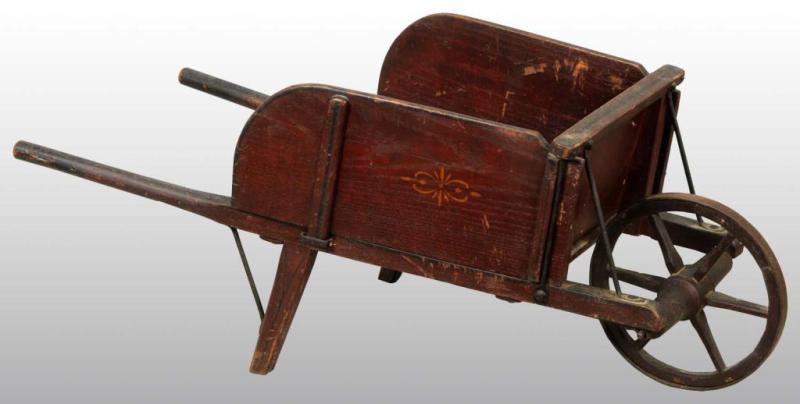 Appraisal: Wooden Primitive Stenciled Wheelbarrow Description Spoked wheel Condition Excellent Size