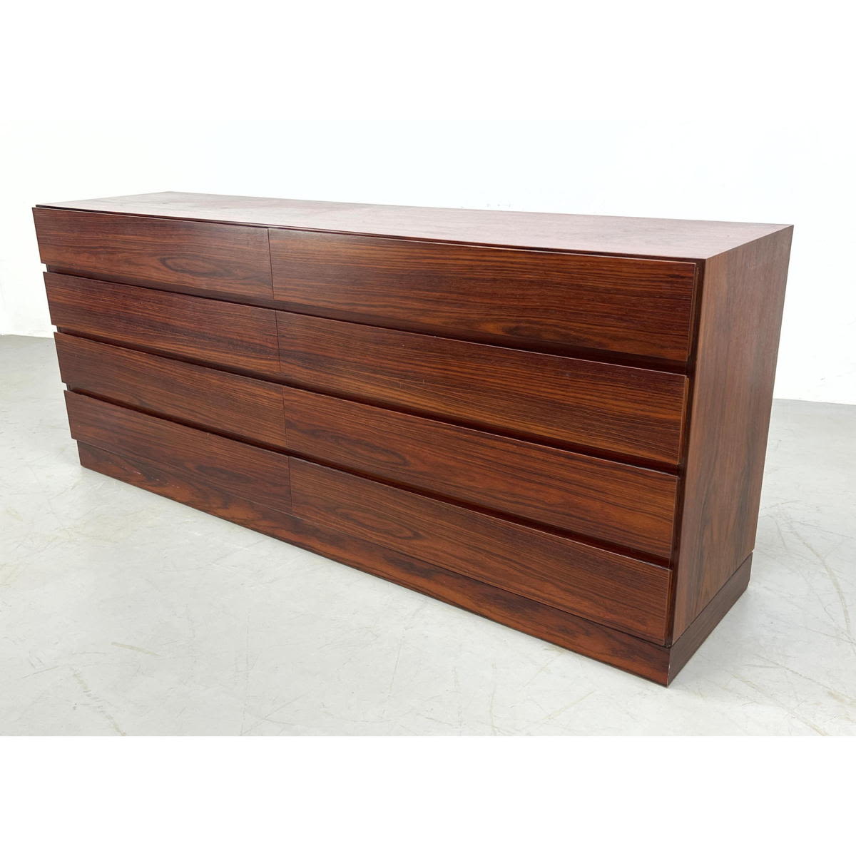 Appraisal: Modernist Rosewood Credenza Dresser Platform base Dimensions H inches W