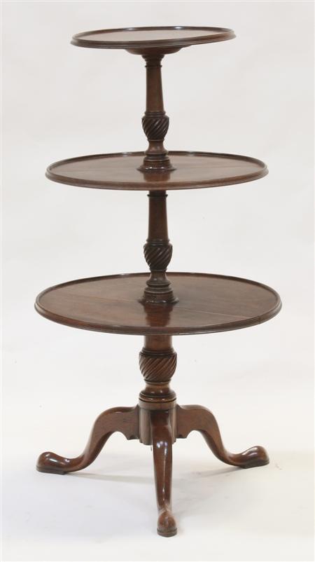 Appraisal: A George III mahogany dumb waiter of three dished and