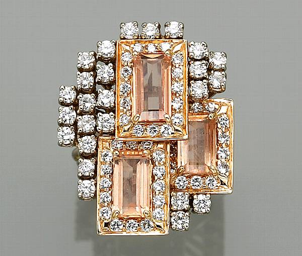 Appraisal: A precious topaz diamond and fourteen karat bicolor gold ring