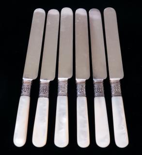 Appraisal: Meriden MOP Butter Knives Six Marked to blade Meriden Cutlery