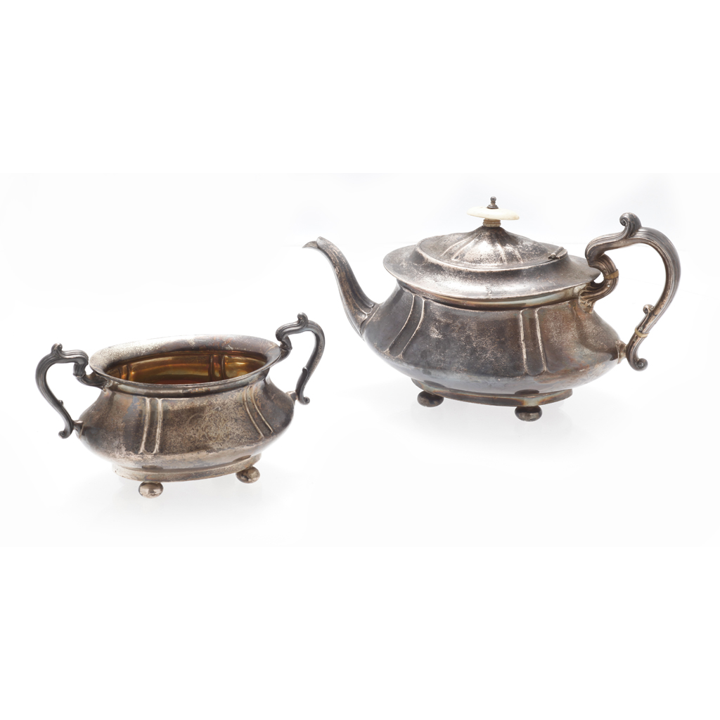 Appraisal: A teapot and sucrier JC Birmingham of oval form panelled