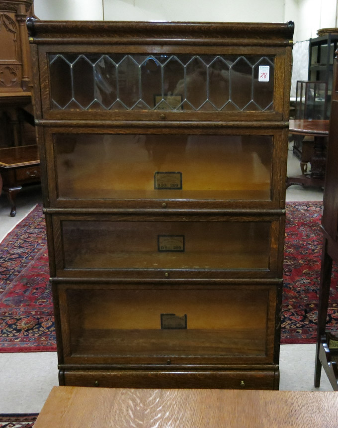 Appraisal: FOUR-SECTION STACKING OAK BOOKCASE The Globe-Wernicke Co Ohio c -