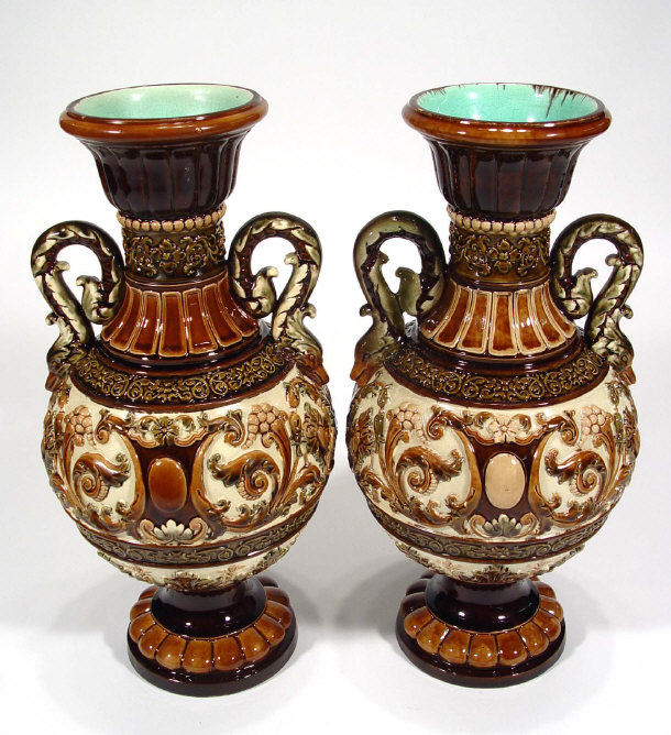 Appraisal: Pair of Continental Majolica style pottery vases with relief moulded