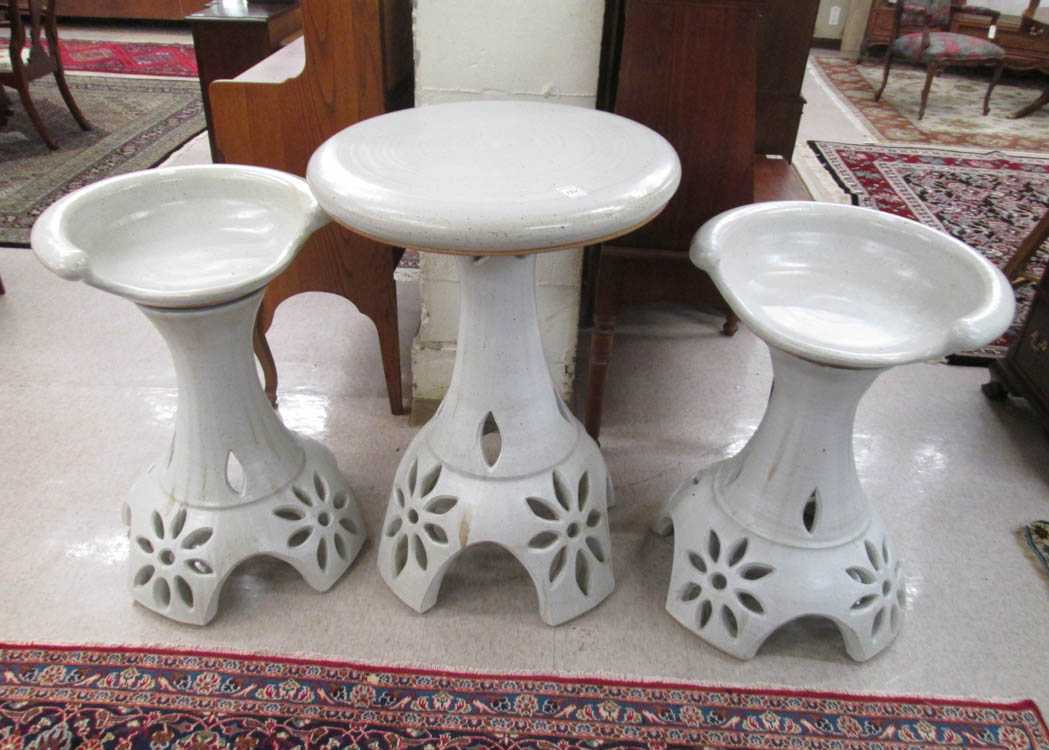 Appraisal: THREE-PIECE ART POTTERY CAFE TABLE AND STOOL SET Joel Cottet