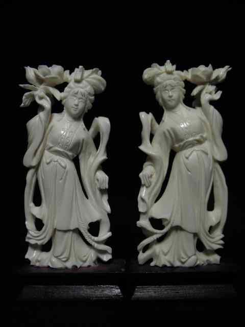 Appraisal: Pair of Chinese carved ivory figures depicting Godesses with Lotus