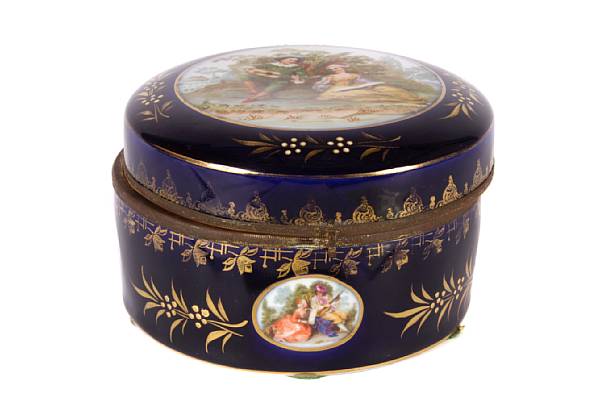 Appraisal: A German cylindrical form porcelain lidded box together with a