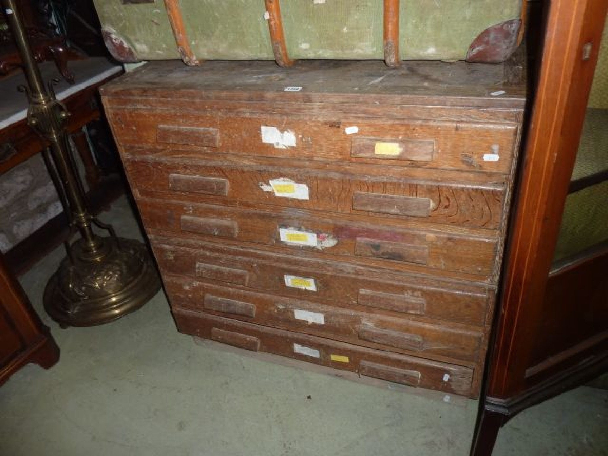 Appraisal: A small two sectional plan chest in oak fitted with