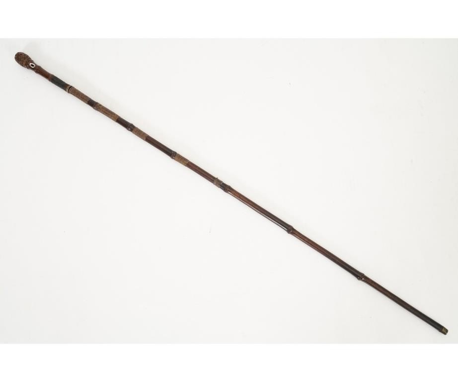 Appraisal: Rare walking stick with concealed iron sword ornately etched and