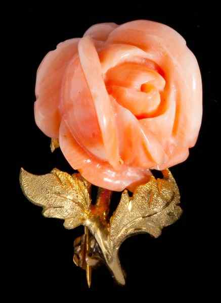 Appraisal: Gold and Salmon Coral Rose Broochcarved in a rose motif