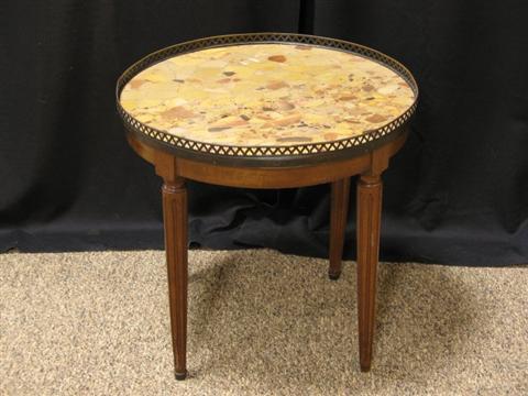 Appraisal: LOUIS XVI STYLE MAHOGANY CIRCULAR TABLE th century the galleried