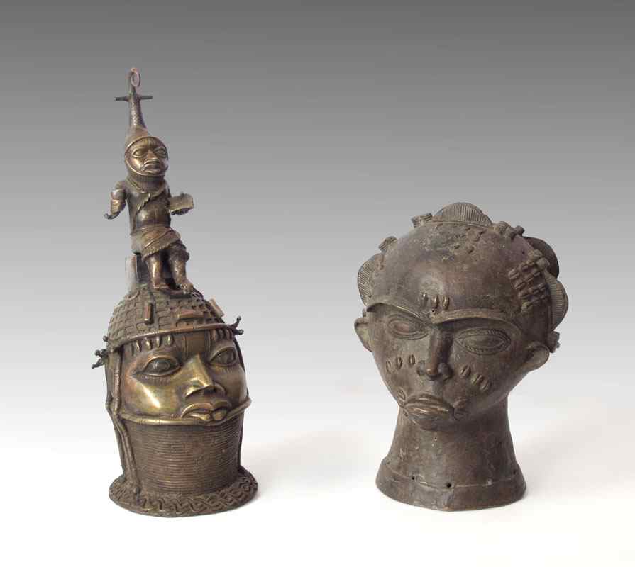 Appraisal: TWO BENIN AFRICAN HEAD FIGURES SCULPTURE One measures '' h