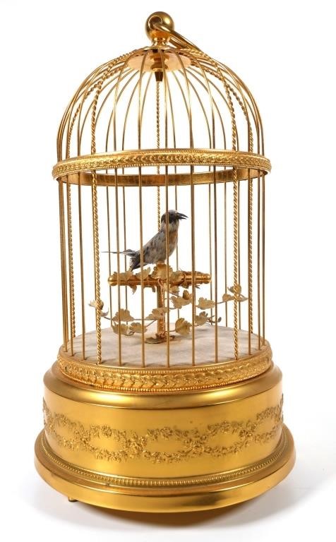 Appraisal: Swiss th century Working singing bird automaton in gilt metal