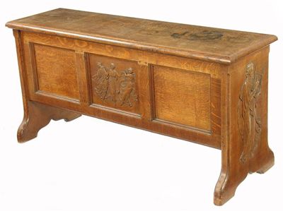 Appraisal: An Arts and Craft boarded and panelled oak chest the