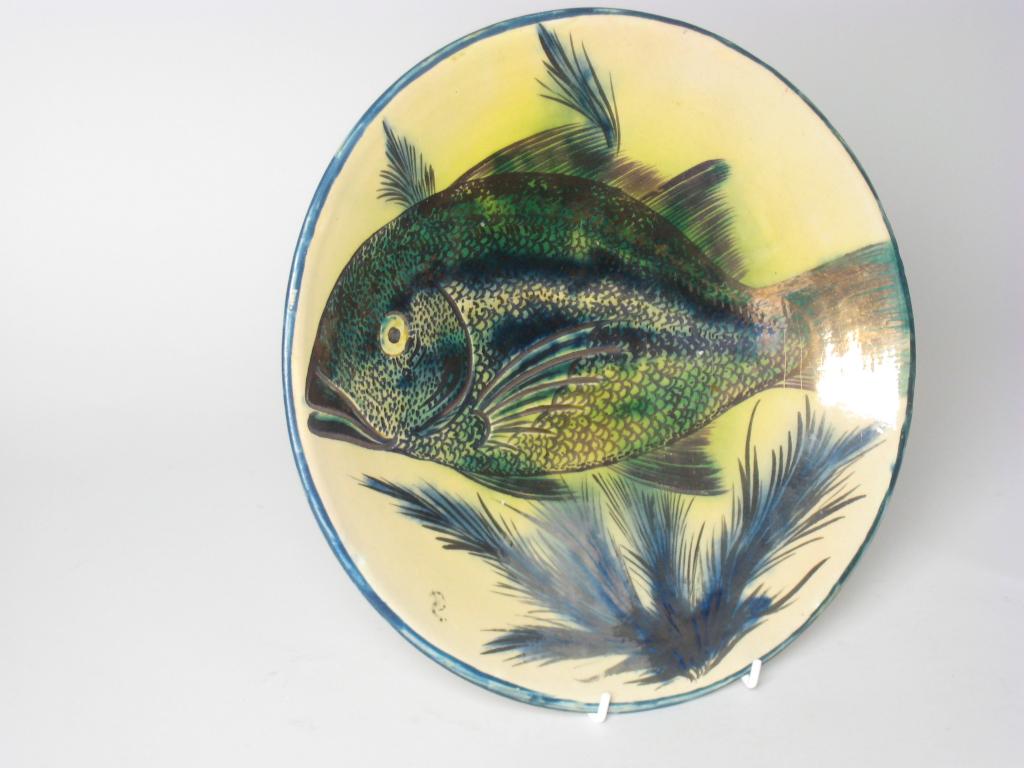 Appraisal: An Art pottery Charger decorated carp with lustrous glaze in