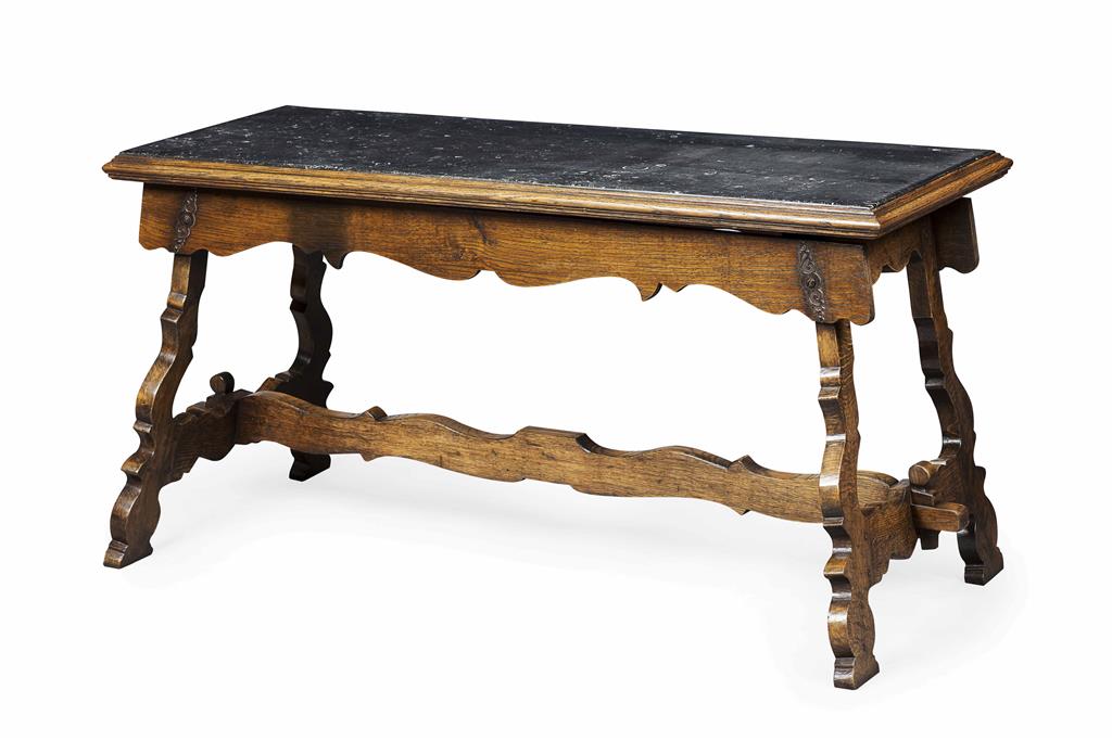 Appraisal: SPANISH STYLE OAK AND SLATE TOPPED TABLE the rectangular moulded