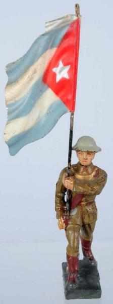 Appraisal: Lineol Cuban Flag-Bearer Composition cm flagman with tin flag Glue