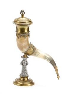 Appraisal: Continental Horn Mounted Centerpiece with Putto Continental th century A