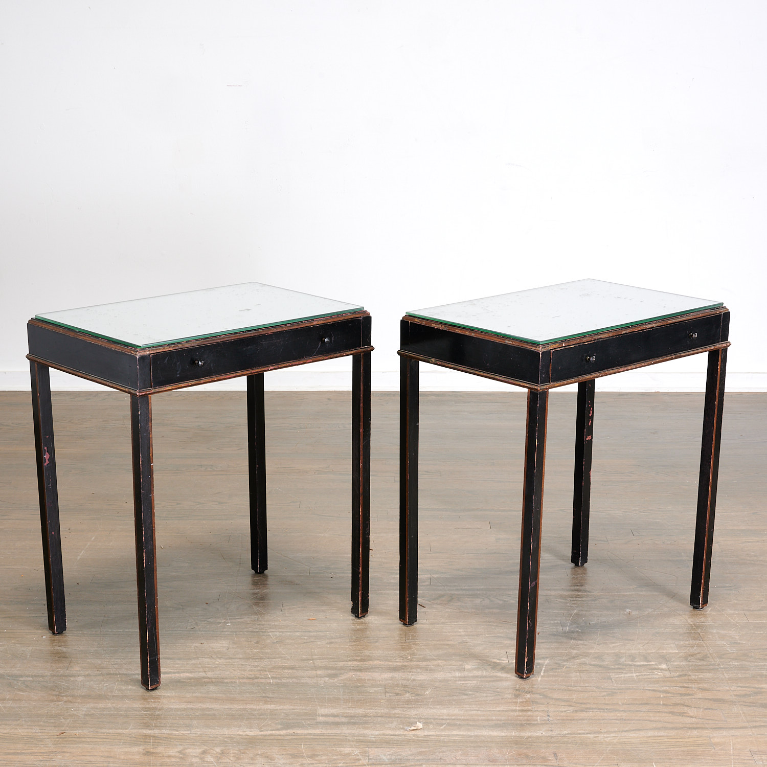 Appraisal: TOMMI PARZINGER MANNER PAIR SIDE TABLES Manner of Tommi Parzinger