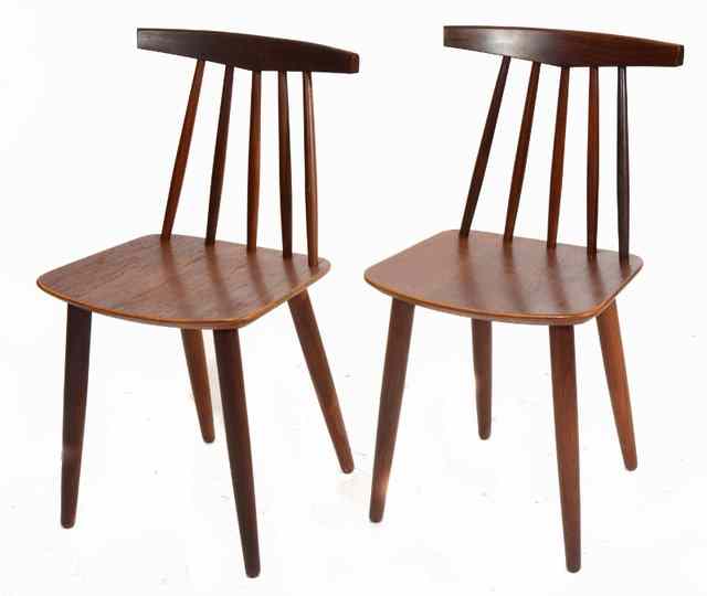 Appraisal: A SET OF FOUR DANISH ROSEWOOD stick back chairs by