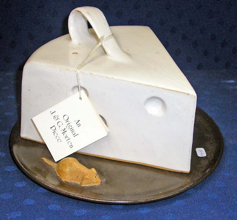 Appraisal: A stoneware cheese dish on plate by J G Morten