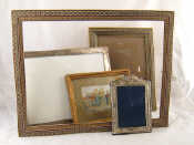 Appraisal: A silver photo frame with hardwood strut back x cmBirmingham