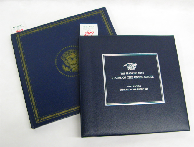 Appraisal: TWO ALBUMS OF STERLING SILVER COINS from The Franklin Mint