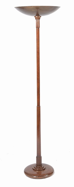 Appraisal: A patinated metal and mahogany floor standing torchere cm high