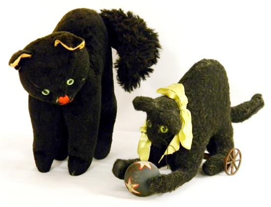 Appraisal: Early cat and ball pull toy black plush '' h