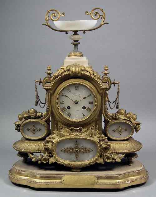 Appraisal: A th Century French gilt brass and alabaster mantel clock