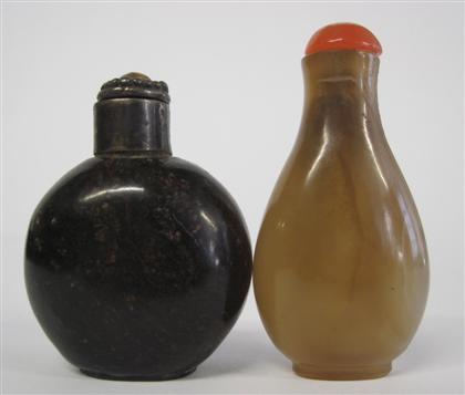 Appraisal: Two Chinese hardstone snuff bottlesComprising a slender pear-form agate snuff