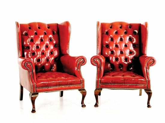 Appraisal: Pair English leather wingback chairs in the Queen Anne style