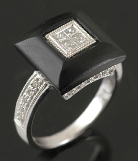 Appraisal: An Art Deco style onyx and diamond plaque ring Centrally