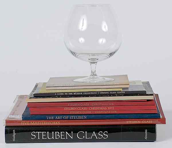 Appraisal: Steuben Snifter Plus Steuben Books American a Steuben glass brandy