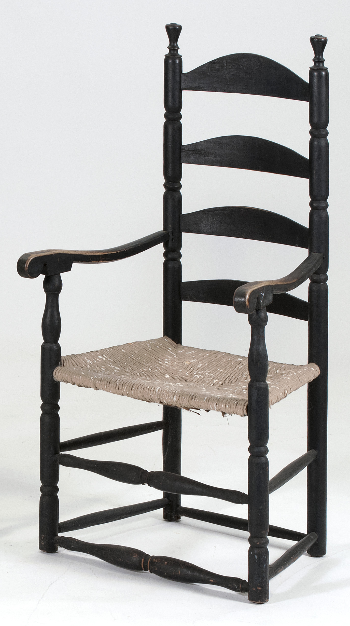 Appraisal: ANTIQUE AMERICAN LADDERBACK ARMCHAIR th CenturyIn old black paint Four