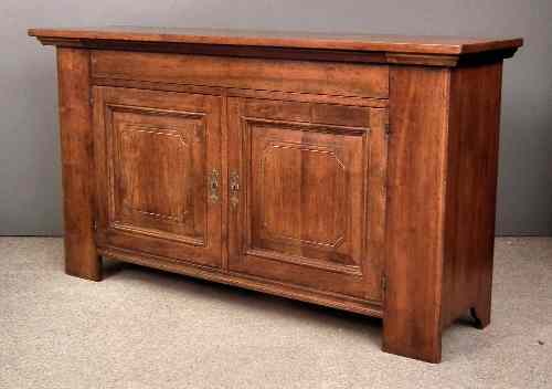 Appraisal: An Italian walnut dresser base enclosed by a pair of