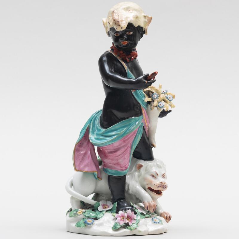 Appraisal: Chelsea Porcelain Figure Emblematic of Africa Unmarked x in diam