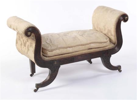 Appraisal: A Regency mahogany framed and upholstered window seat the reeded