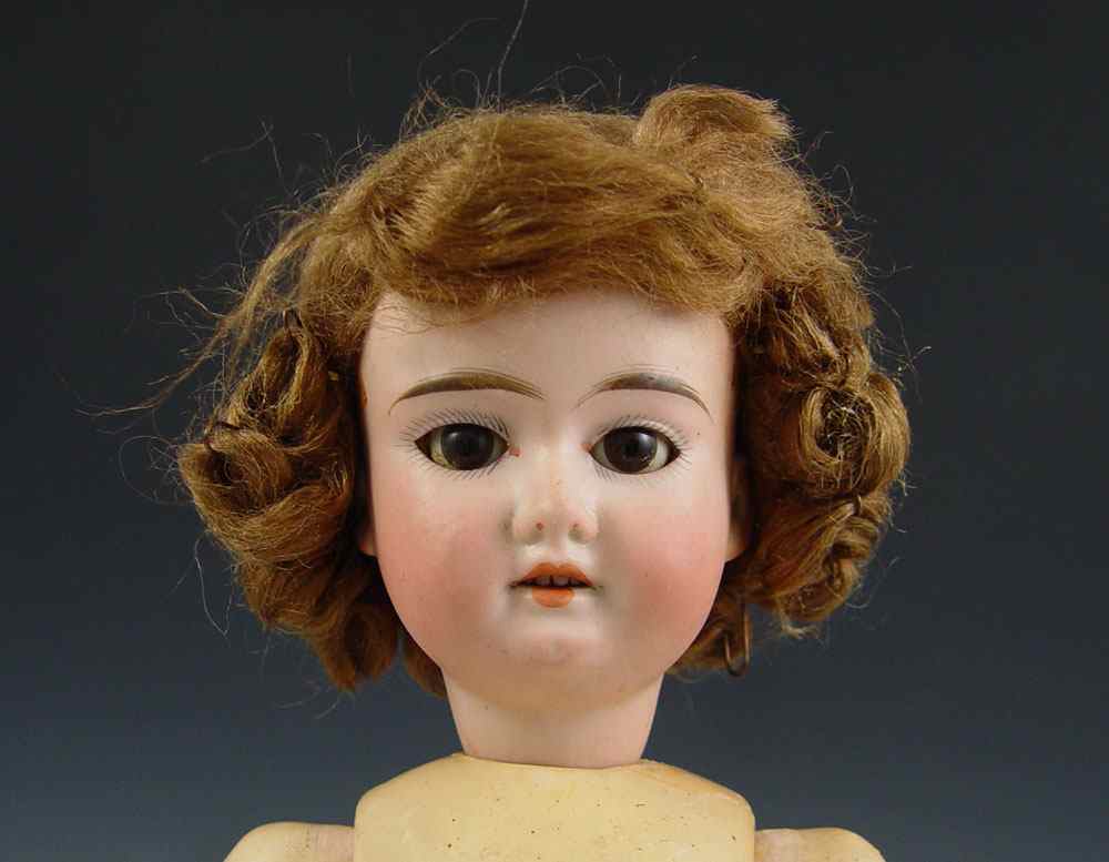 Appraisal: ANTIQUE GERMAN BISQUE HEAD DOLL '' tall doll Marked ''Made