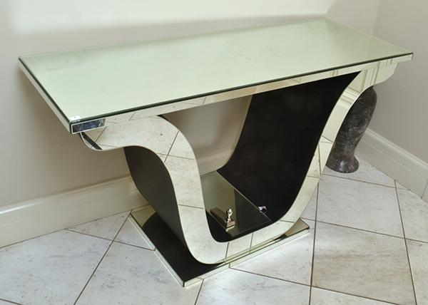 Appraisal: AN ART DECO STYLE MIRRORED CONSOLE WITH A LYRE BASE