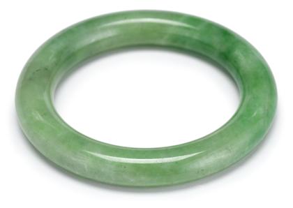 Appraisal: Chinese green jade bangle th century Of rounded circular form