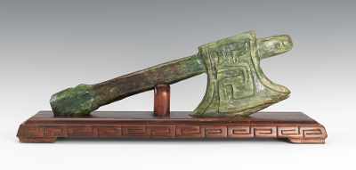 Appraisal: A Dark Spinach Green Jade Axe With carved details on