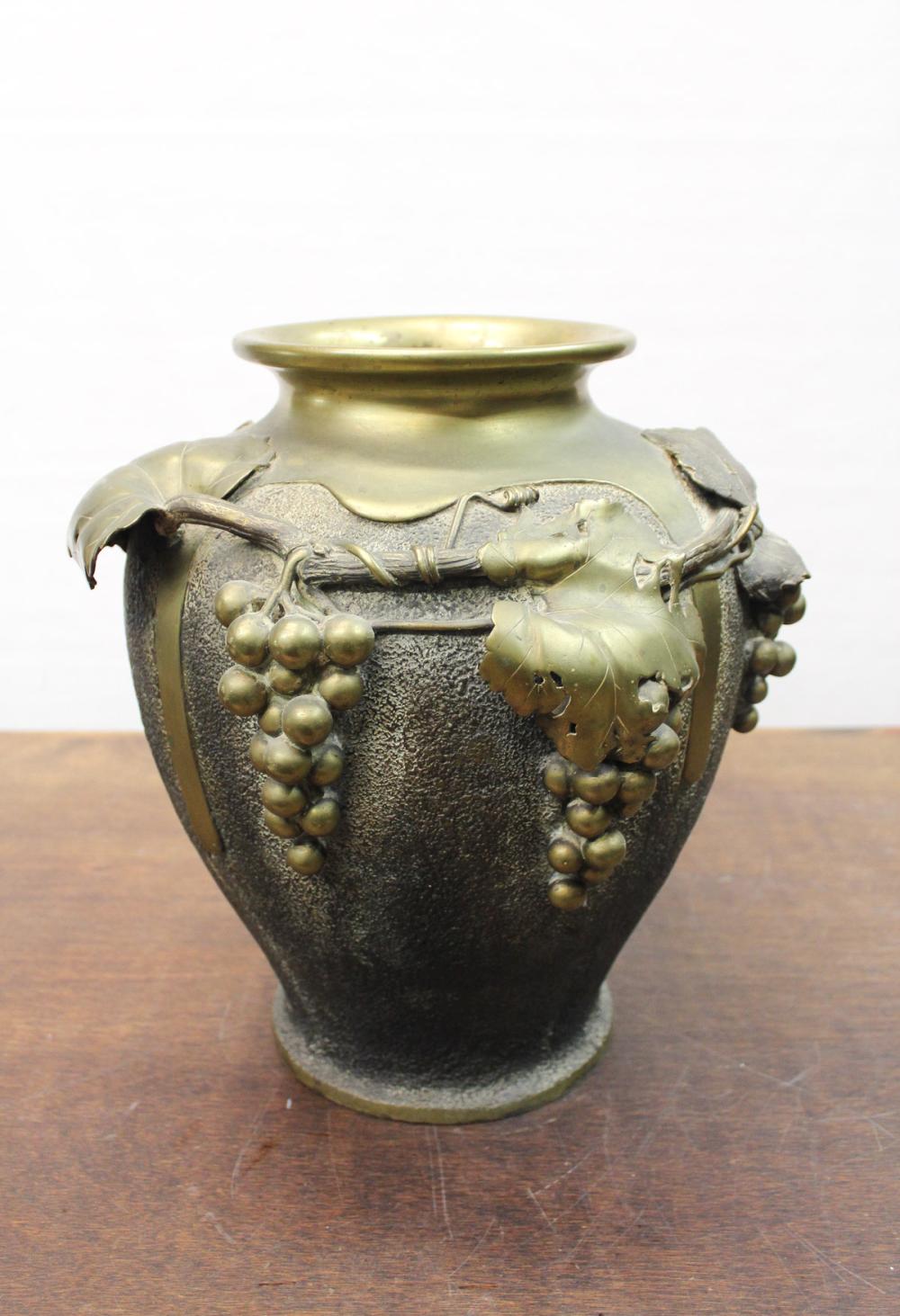 Appraisal: JAPANESE BRASS VASE with high relief depicting a grapevine motif