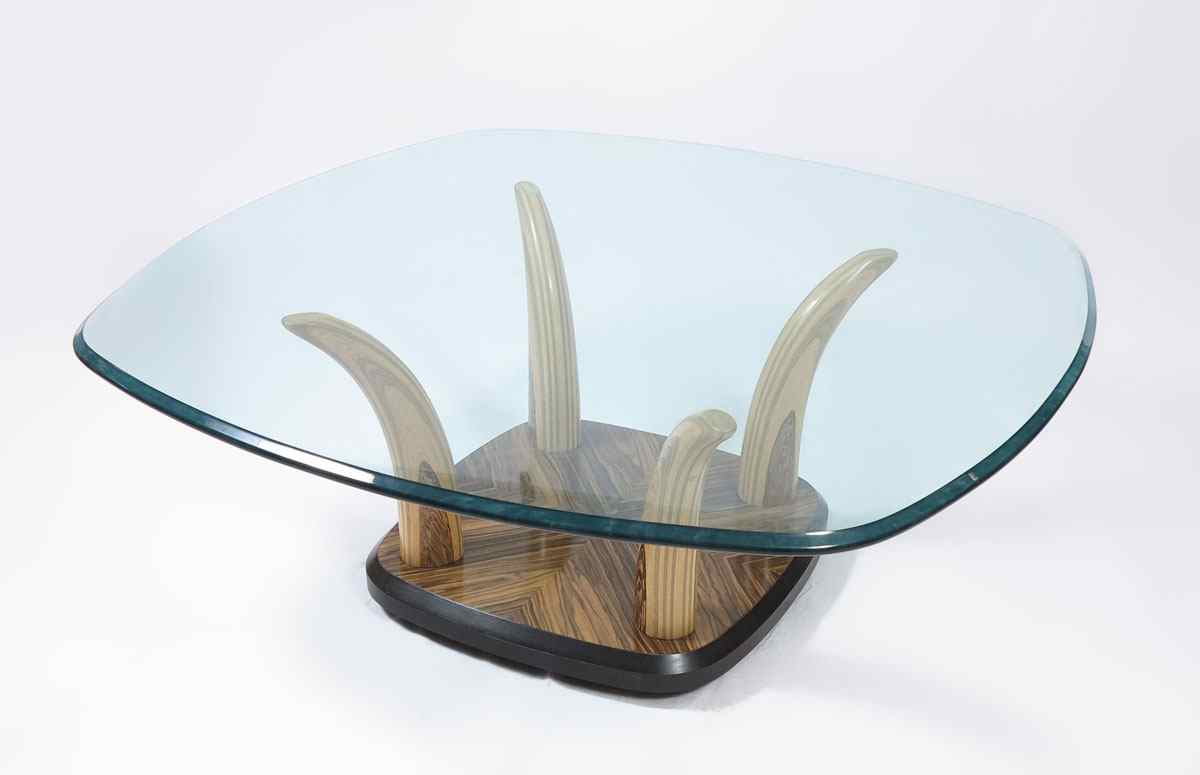 Appraisal: HENREDON MODERNE GLASS TOP COFFEE TABLE Layered wood base and