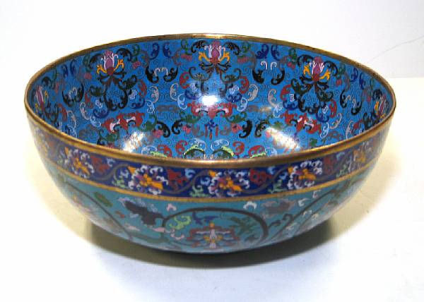 Appraisal: A cloisonn enamel punch bowl The deep-set bowl decorated on