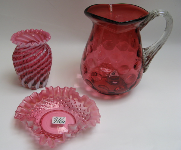 Appraisal: THREE COLORED GLASS ITEMS One is a Cranberry coin spot