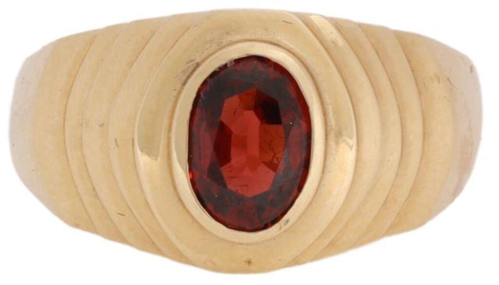 Appraisal: Estate Gent's kt yellow gold ring set with a reddish