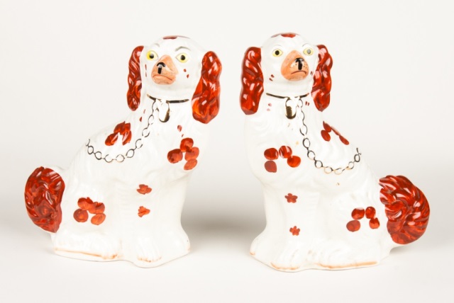 Appraisal: a Pair of Staffordshire King Charles spaniels th century impressed