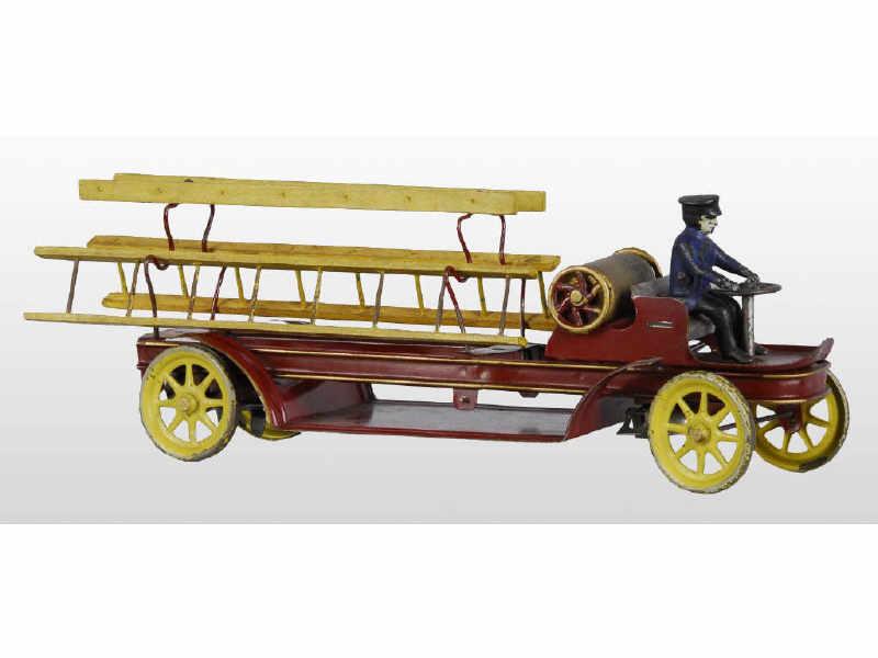 Appraisal: Tin Kingsbury Ladder Wagon Toy Description Original driver ladders and